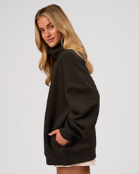 Woman wearing Go-To Oversized Mock Neck Sweater - Ground Coffee | Model:Issy | Size:XS | Thumbnail Index: 9