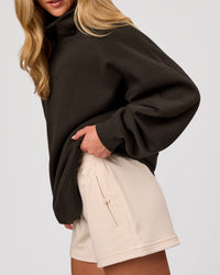 Woman wearing Go-To Oversized Mock Neck Sweater - Ground Coffee | Model:Issy | Size:XS | Thumbnail Index: 10