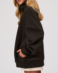 Woman wearing Go-To Oversized Mock Neck Sweater - Ground Coffee | Model:Issy | Size:XS | Thumbnail Index: 11