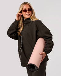 Woman wearing Go-To Oversized Mock Neck Sweater - Ground Coffee | Model:Issy | Size:XS | Thumbnail Index: 12