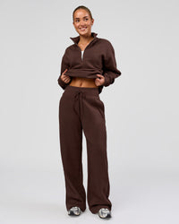 Woman wearing Go-To Oversized Quarter Zip Sweater - Hot Chocolate | Model:Issy | Size:XS