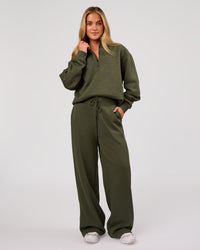 Woman wearing Go-To Oversized Quarter Zip Sweater - Pure Olive | Model:Issy | Size:XS | Thumbnail Index: 5