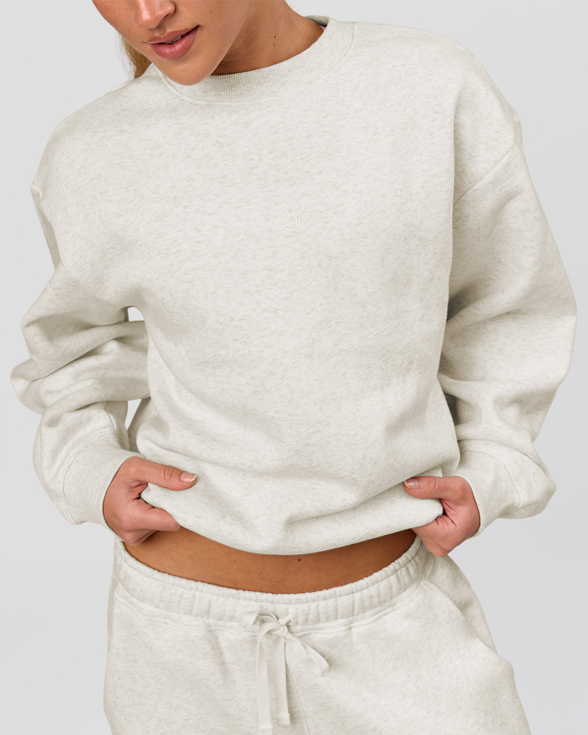 Woman wearing Go-To Oversized Sweater - Silver Marl | Model:Issy | Size:XS