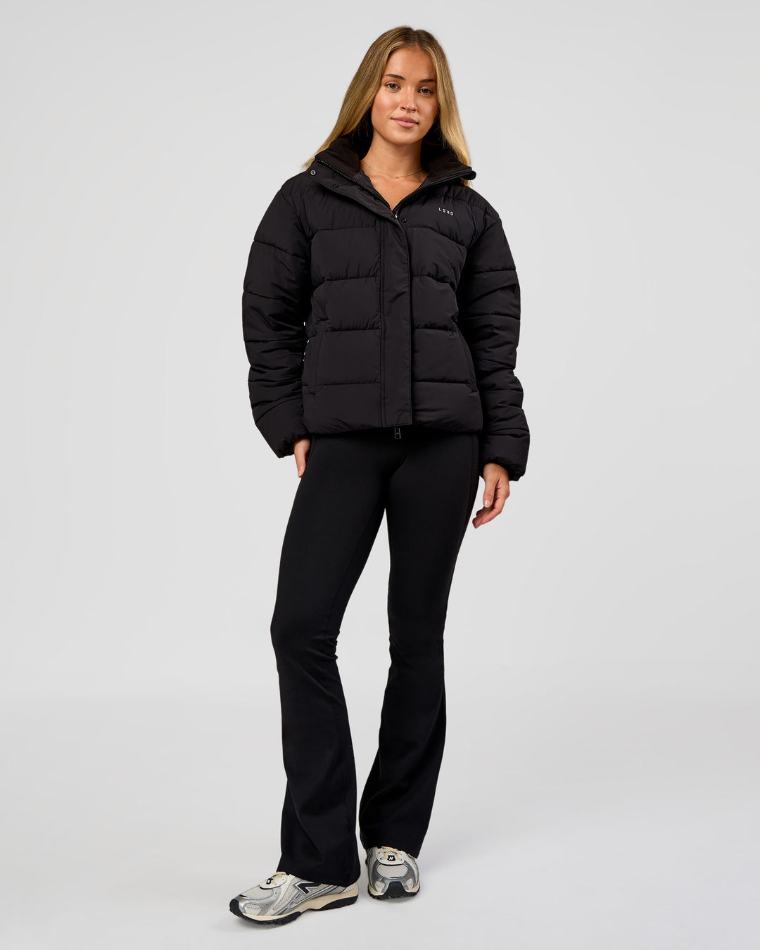 Woman wearing Go-To Puffer Jacket - Black | Model:Issy | Size:XS - view 7