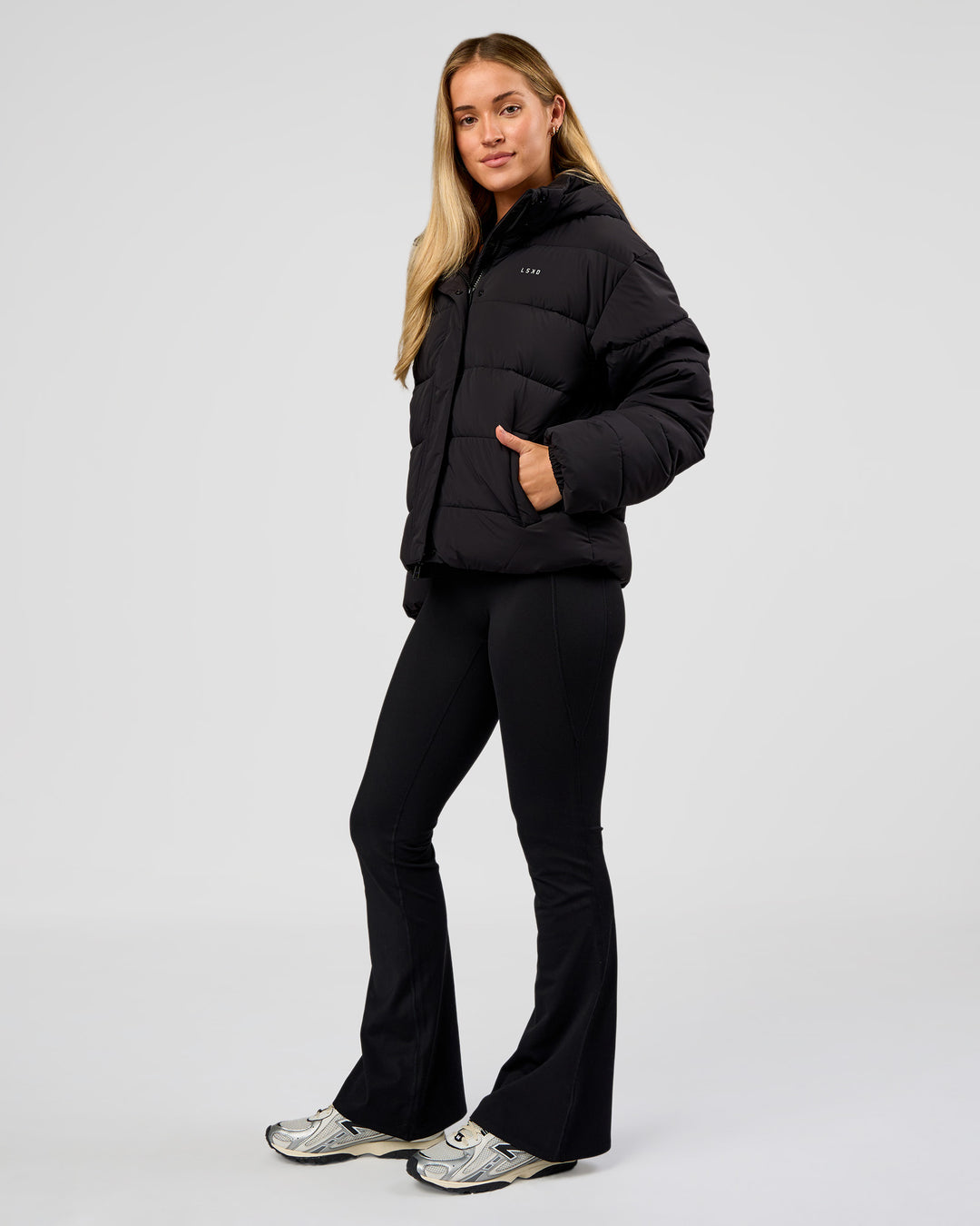 Woman wearing Go-To Puffer Jacket - Black | Model:Issy | Size:XS - view 9