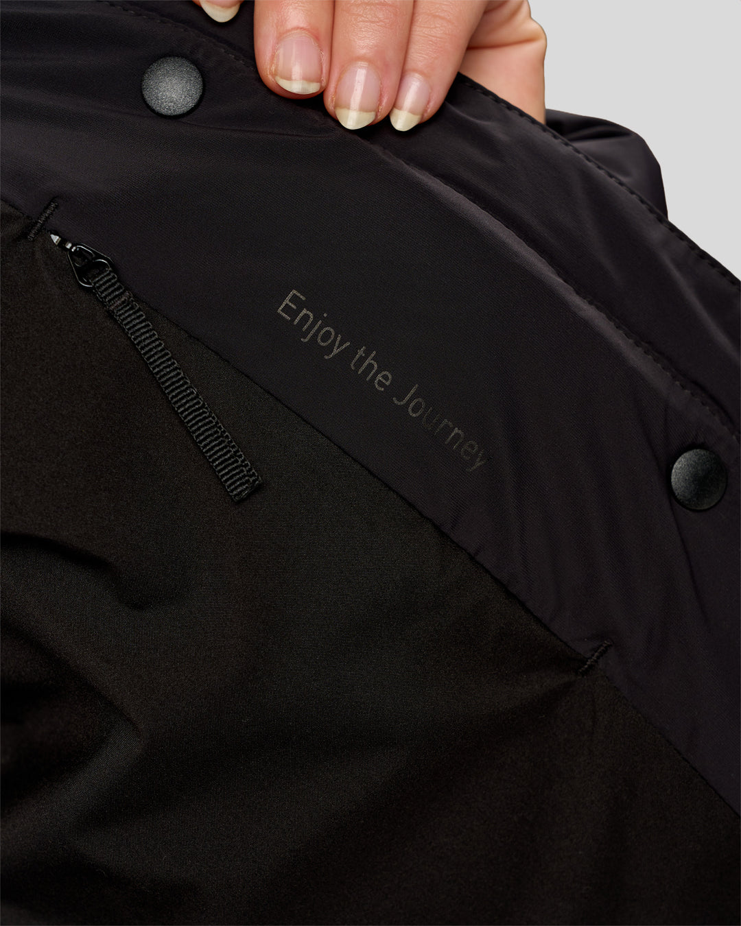 Woman wearing Go-To Puffer Jacket - Black | Model:Issy | Size:XS - view 10