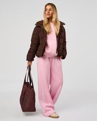 Woman wearing Go-To Puffer Jacket - Hot Chocolate | Model:Issy | Size:XS