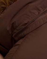 Woman wearing Go-To Puffer Jacket - Hot Chocolate | Model:Issy | Size:XS