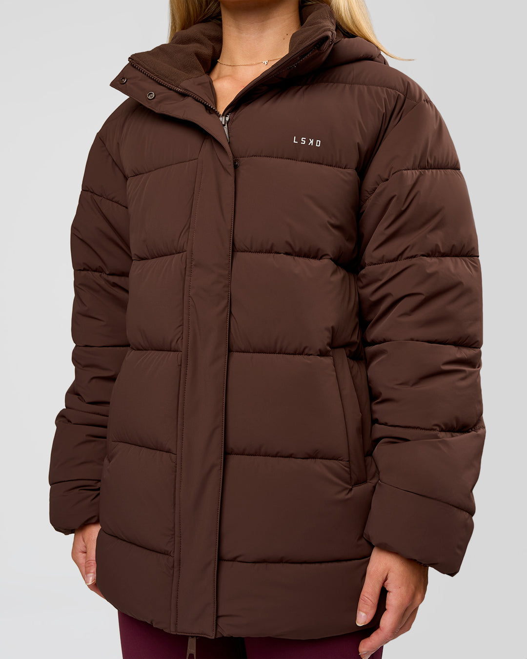 Woman wearing Go-To Puffer Mid Jacket - Hot Chocolate | Model:Issy | Size:XS - view 2
