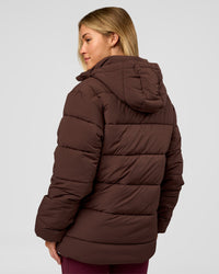 Woman wearing Go-To Puffer Mid Jacket - Hot Chocolate | Model:Issy | Size:XS | Thumbnail Index: 2