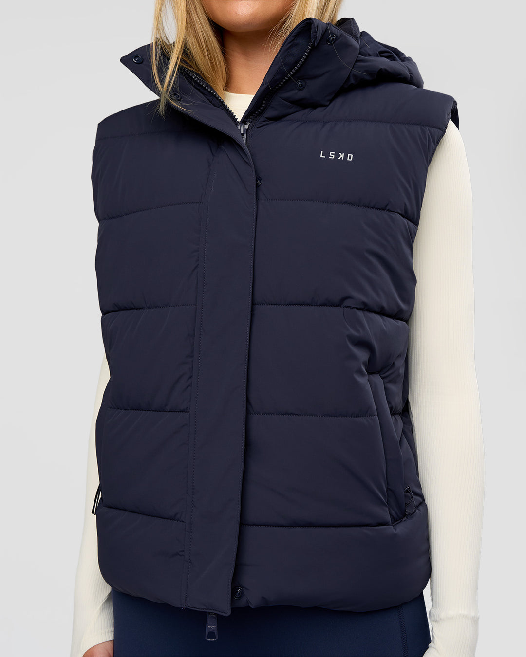 Woman wearing Go-To Puffer Vest - Future Navy | Model:Issy | Size:XS