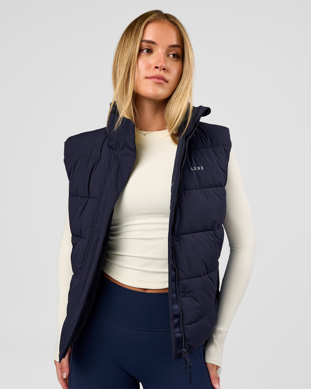 Woman wearing Go-To Puffer Vest - Future Navy | Model:Issy | Size:XS