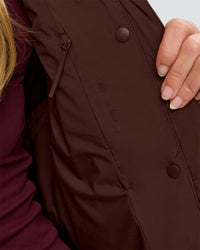 Woman wearing Go-To Puffer Vest - Hot Chocolate | Model:Issy | Size:XS