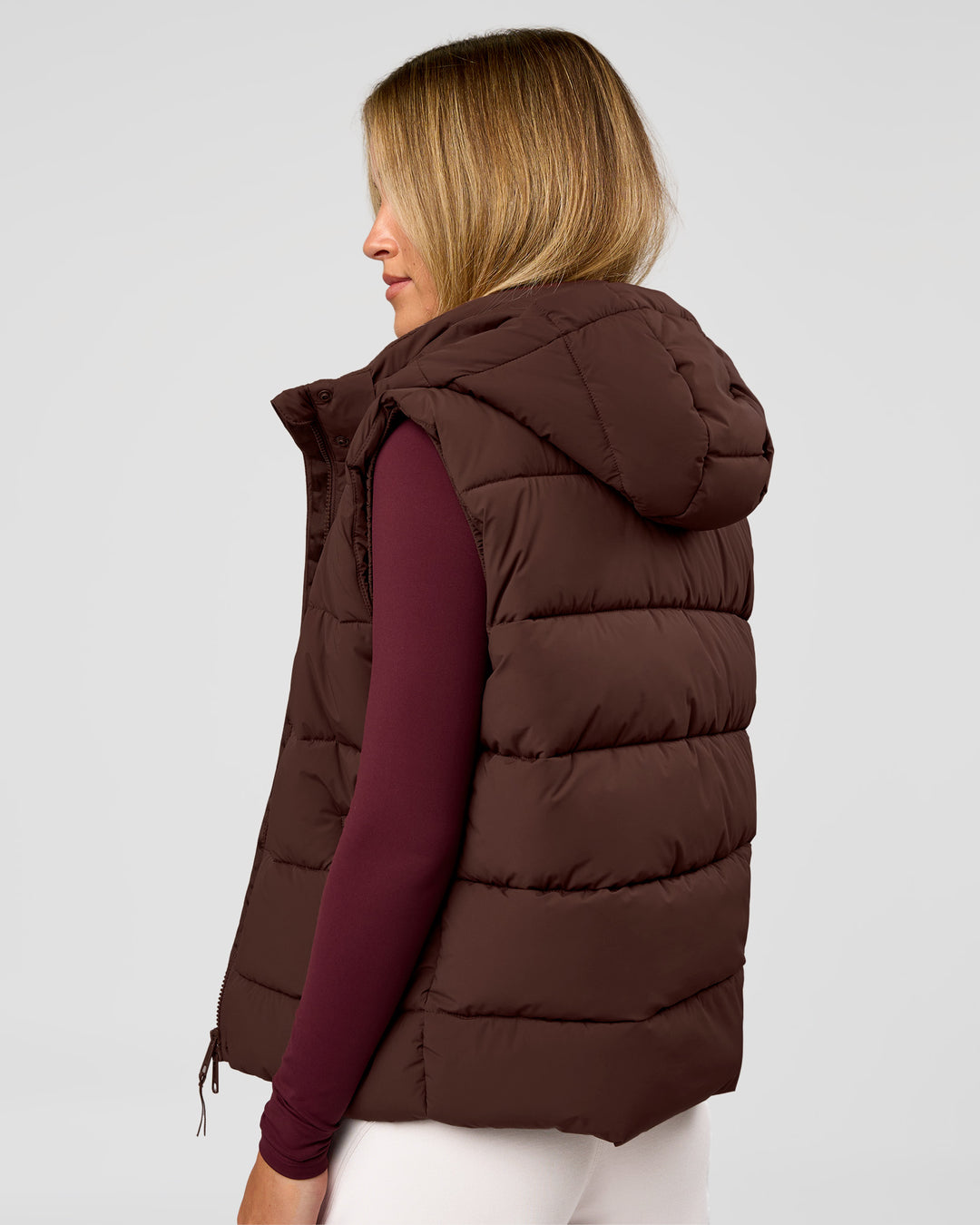 Woman wearing Go-To Puffer Vest - Hot Chocolate | Model:Issy | Size:XS