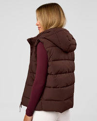 Woman wearing Go-To Puffer Vest - Hot Chocolate | Model:Issy | Size:XS