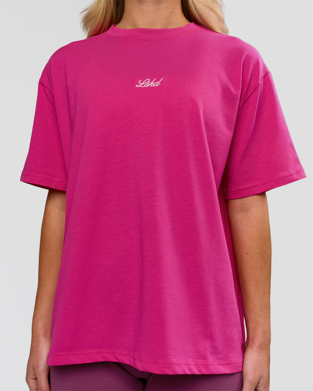 Woman wearing Go-To Script FLXCotton Oversized Tee - Ultra Pink-White | Model:Issy | Size:XS - view 2