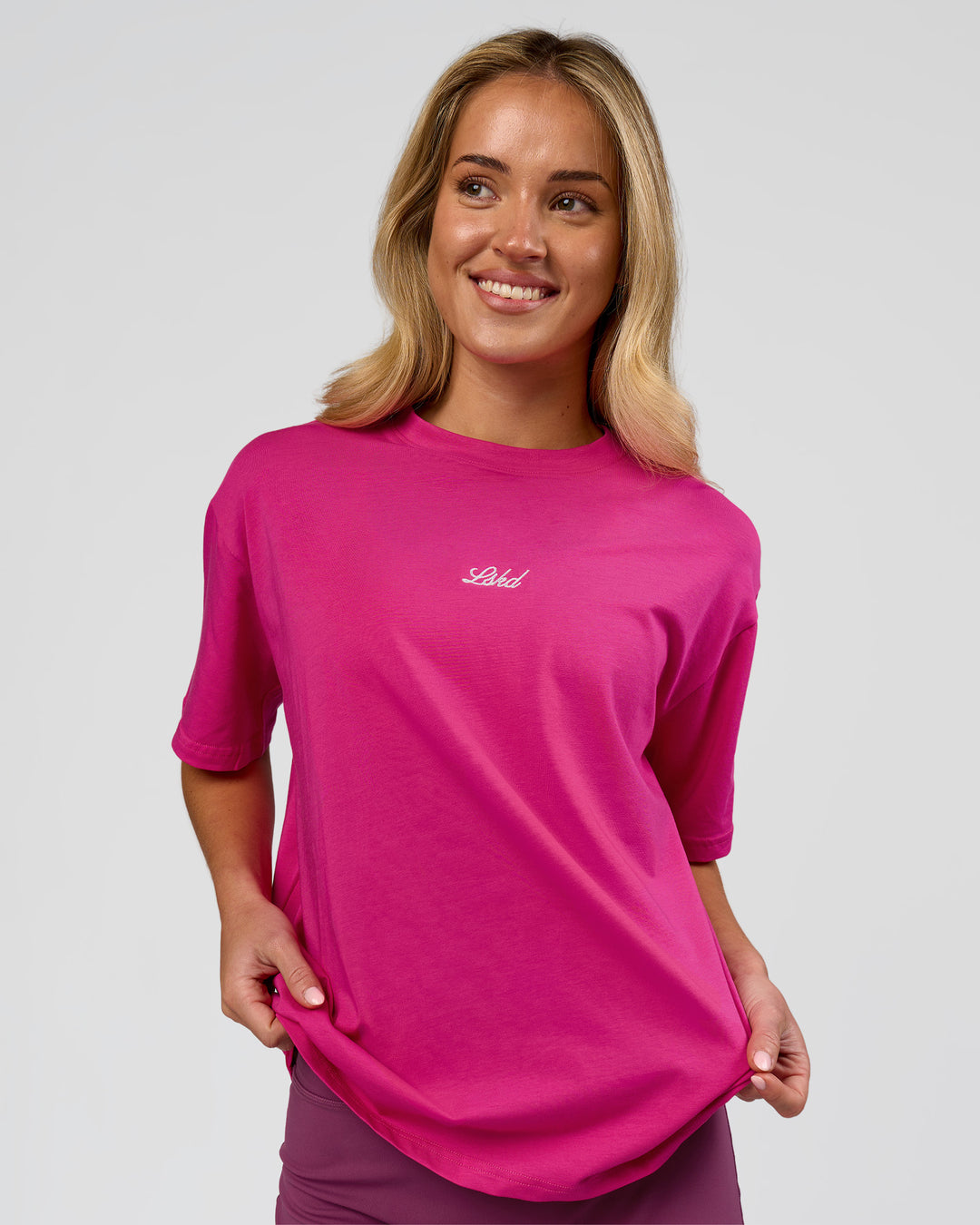 Woman wearing Go-To Script FLXCotton Oversized Tee - Ultra Pink-White | Model:Issy | Size:XS - view 7