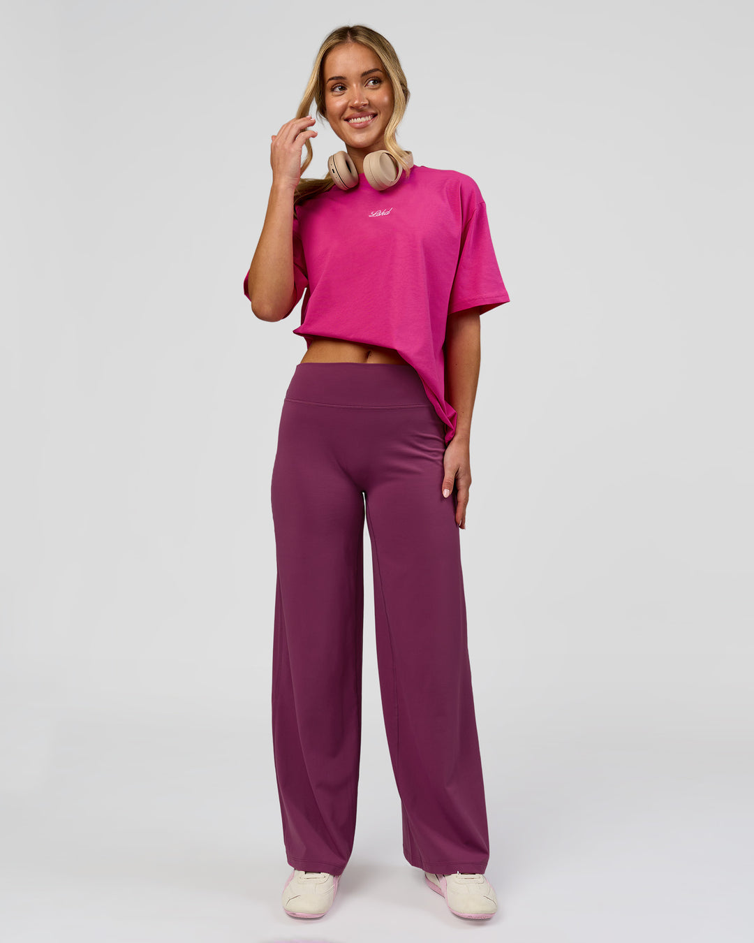 Woman wearing Go-To Script FLXCotton Oversized Tee - Ultra Pink-White | Model:Issy | Size:XS - view 10