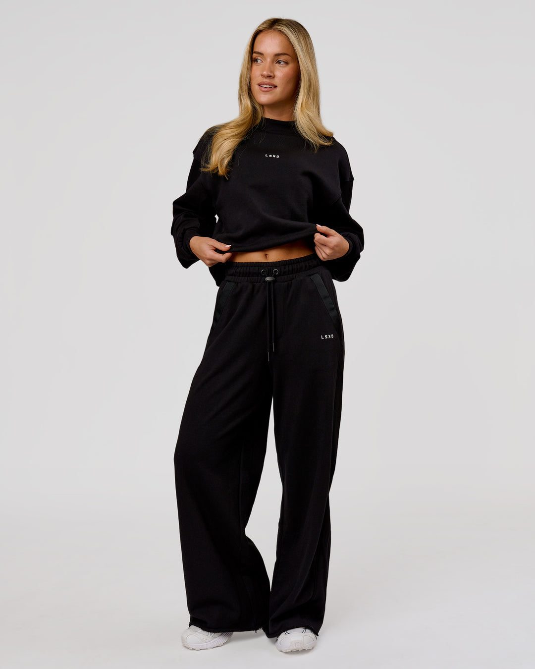 Woman wearing Go-To Terry Oversized Pull Over - Black-White | Model:Issy | Size:XS - view 9