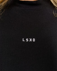 Woman wearing Go-To Terry Oversized Pull Over - Black-White | Model:Issy | Size:XS | Thumbnail Index: 9