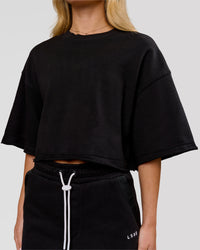 Woman wearing Go-To Terry Oversized Tee - Black | Model:Issy | Size:XS | Thumbnail Index: 0