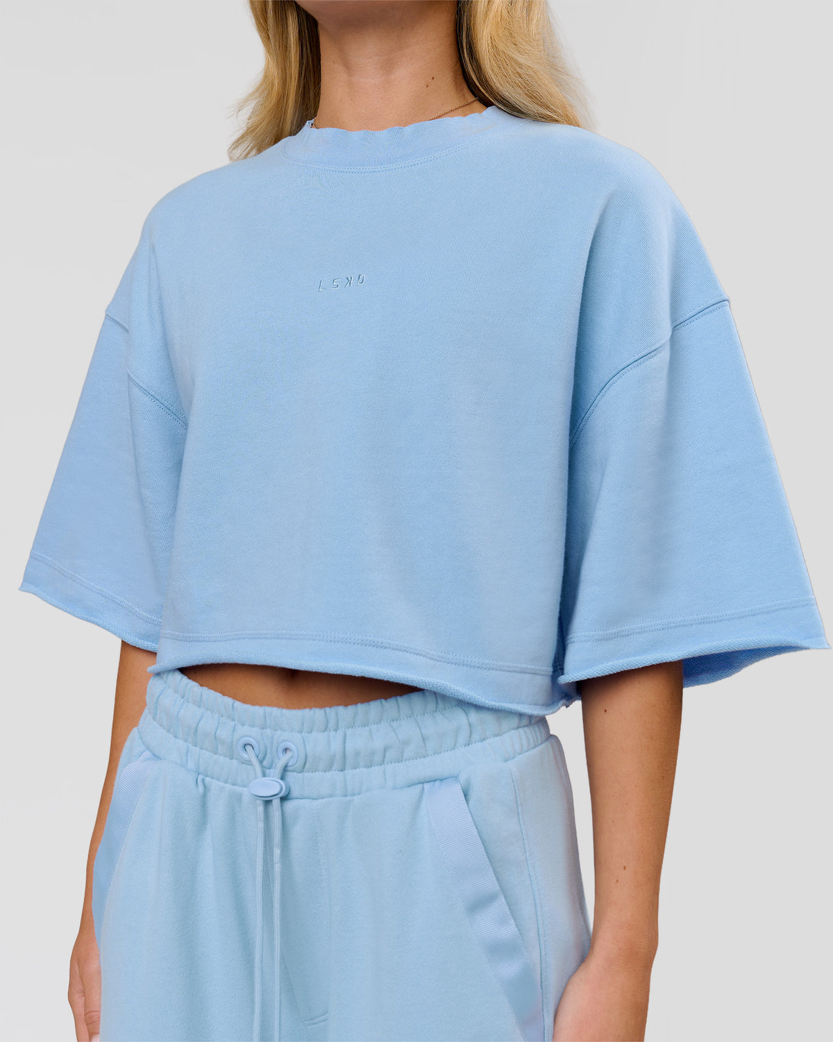 Woman wearing Go-To Terry Oversized Tee - Open Air | Model:Issy | Size:XS
