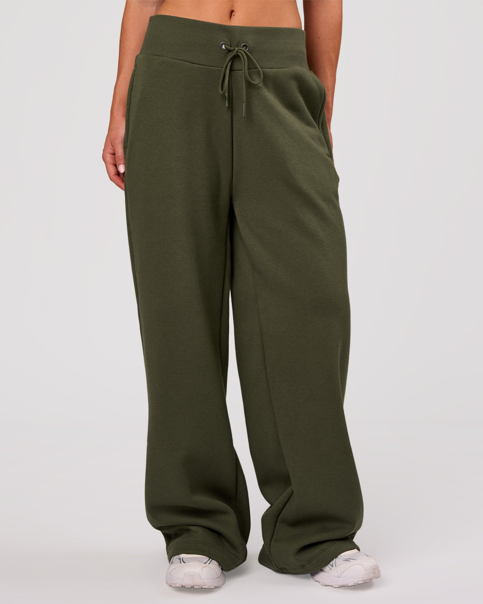 Woman wearing Go-To Wide Leg Track Pant - Pure Olive | Model:Issy | Size:XS