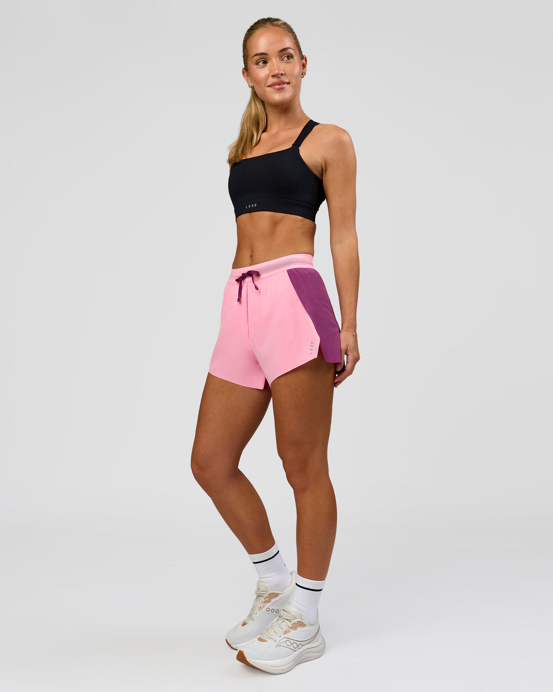 Woman wearing High Velocity Sports Bra - Black | Model:Issy | Size:XS - view 5