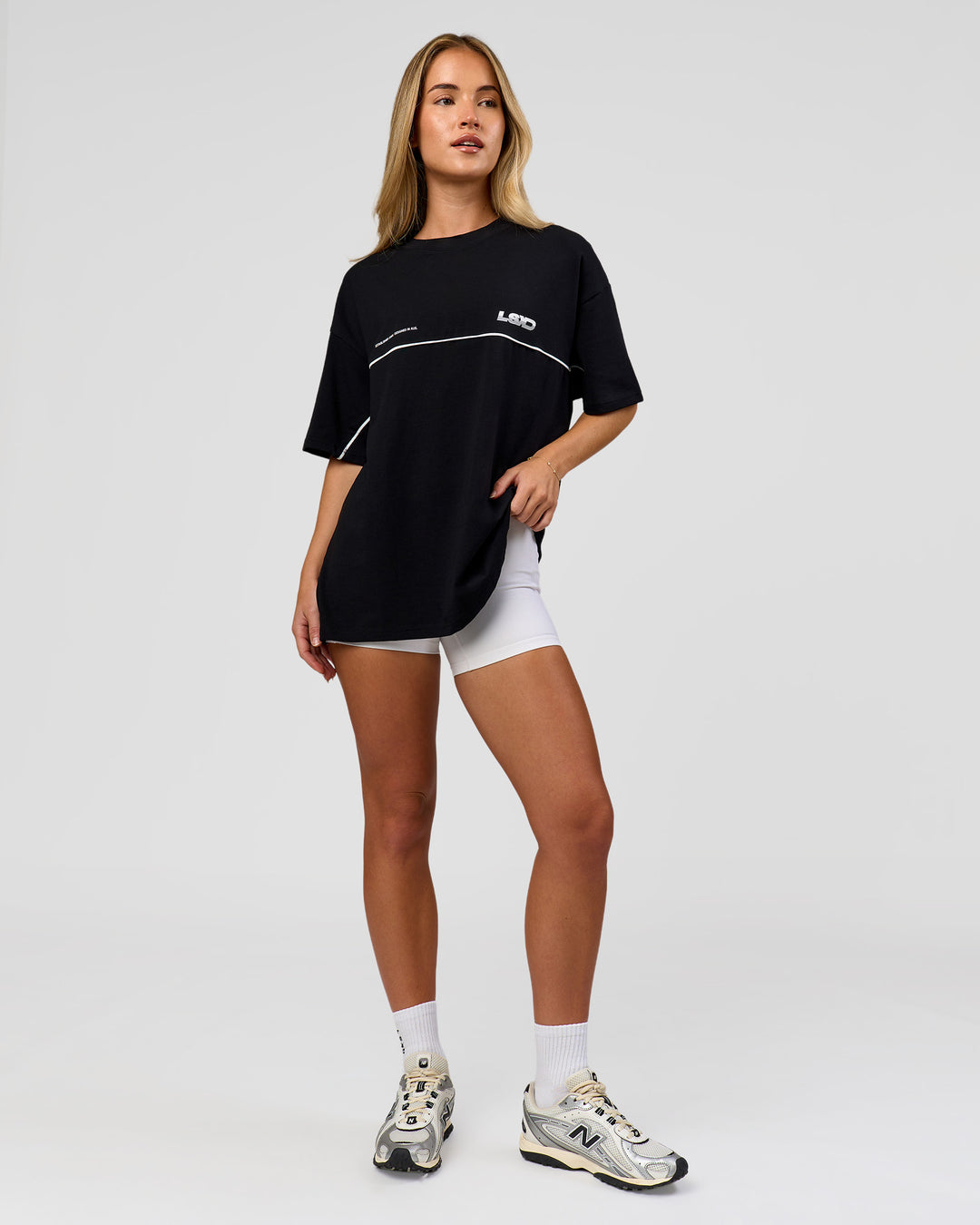 Woman wearing Inline Heavyweight FLXCotton Oversized Tee - Black-White | Model:Issy | Size:XS - view 11