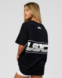 Woman wearing Inline Heavyweight FLXCotton Oversized Tee - Black-White | Model:Issy | Size:XS | Thumbnail Index: 16