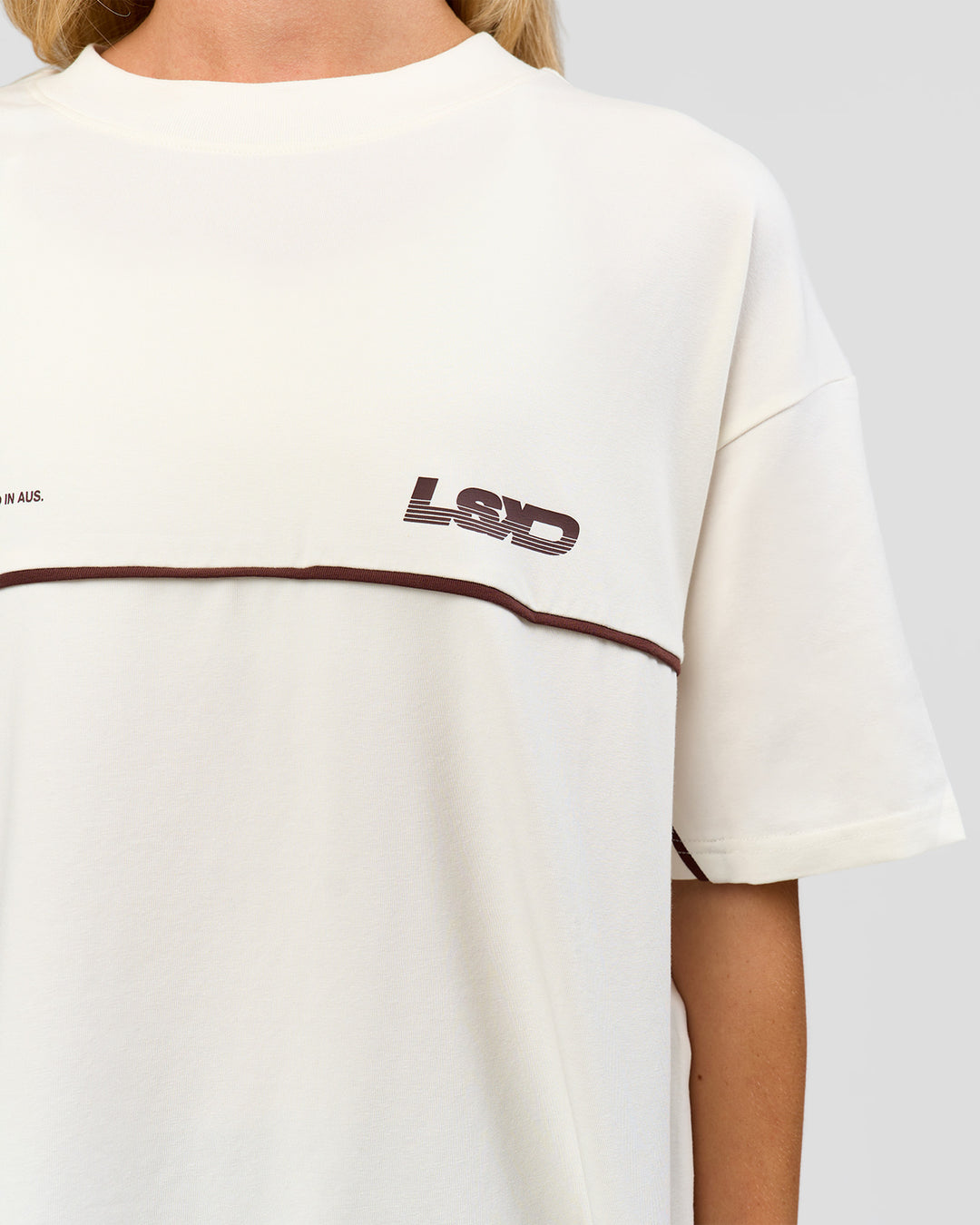 Woman wearing Inline Heavyweight FLXCotton Oversized Tee - Off White-Hot Chocolate | Model:Issy | Size:XS - view 14