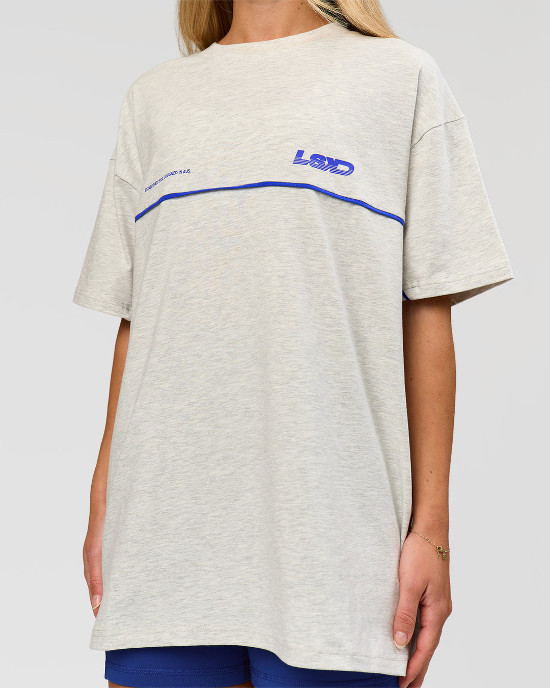 Woman wearing Inline Heavyweight FLXCotton Oversized Tee - Silver Marl-Power Cobalt | Model:Issy | Size:XS - view 11