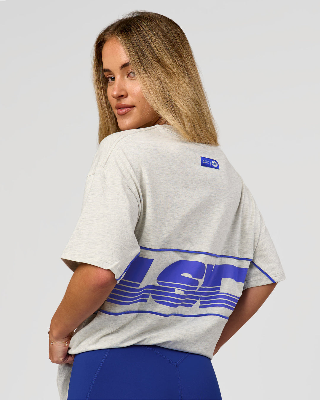 Woman wearing Inline Heavyweight FLXCotton Oversized Tee - Silver Marl-Power Cobalt | Model:Issy | Size:XS - view 12