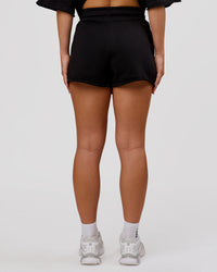 Woman wearing MVP Elite Terry Short - Black-White | Model:Issy | Size:XS | Thumbnail Index: 2