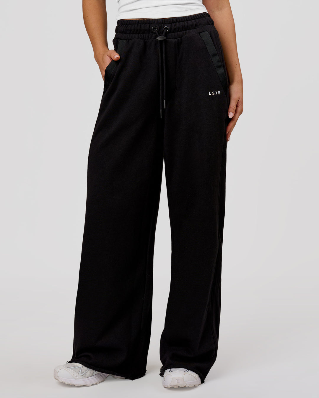 Woman wearing MVP Elite Terry Wide Leg Pant - Black-White | Model:Issy | Size:XS - view 1