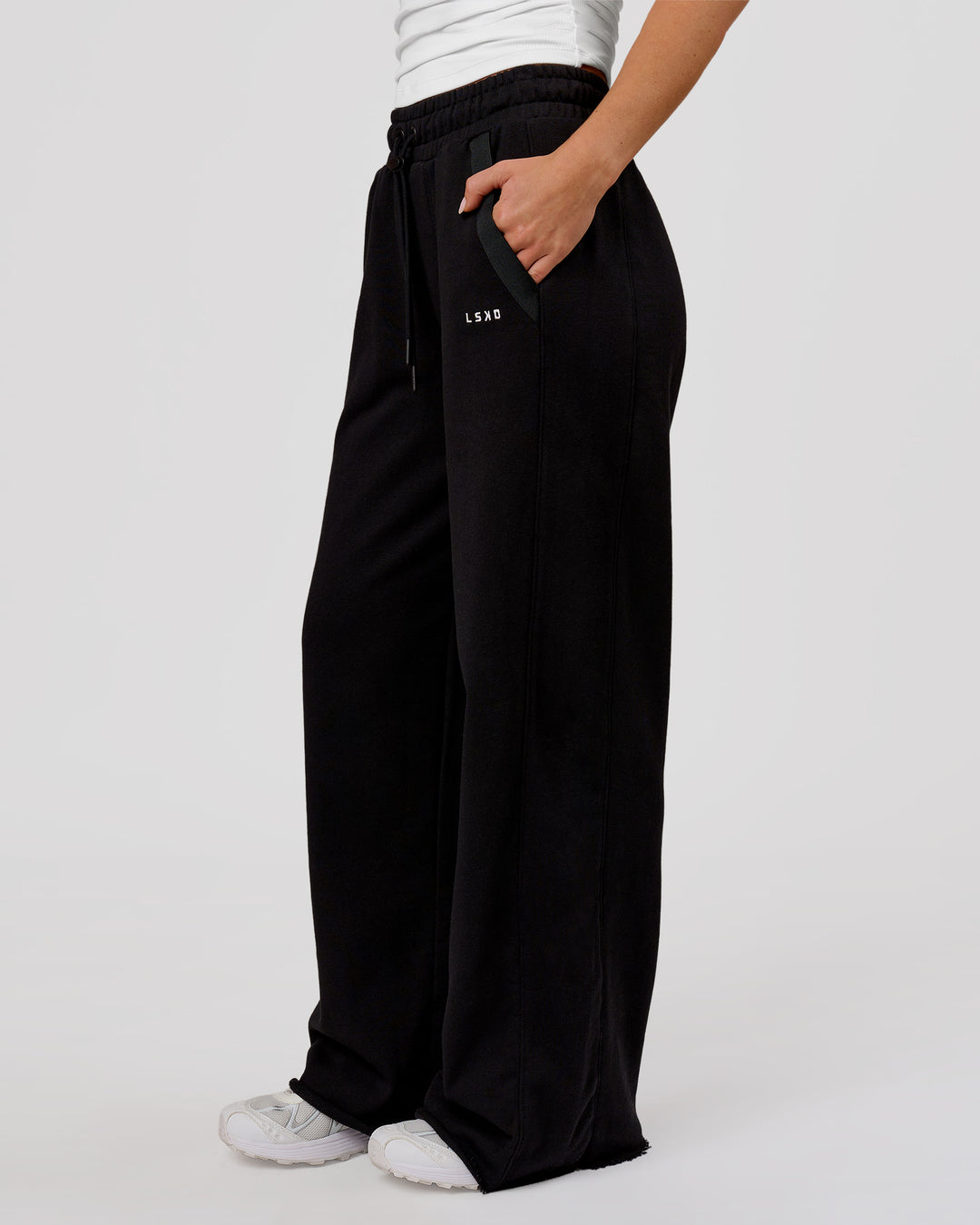 Woman wearing MVP Elite Terry Wide Leg Pant - Black-White | Model:Issy | Size:XS - view 2
