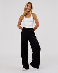 Woman wearing MVP Elite Terry Wide Leg Pant - Black-White | Model:Issy | Size:XS | Thumbnail Index: 3