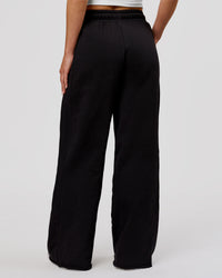 Woman wearing MVP Elite Terry Wide Leg Pant - Black-White | Model:Issy | Size:XS | Thumbnail Index: 4