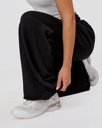 Woman wearing MVP Elite Terry Wide Leg Pant - Black-White | Model:Issy | Size:XS | Thumbnail Index: 5