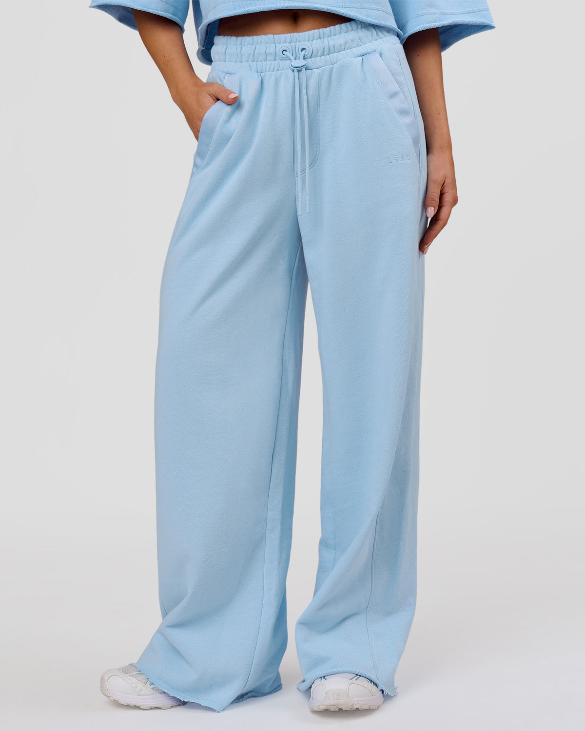 Woman wearing MVP Elite Terry Wide Leg Pant - Open Air | Model:Issy | Size:XS