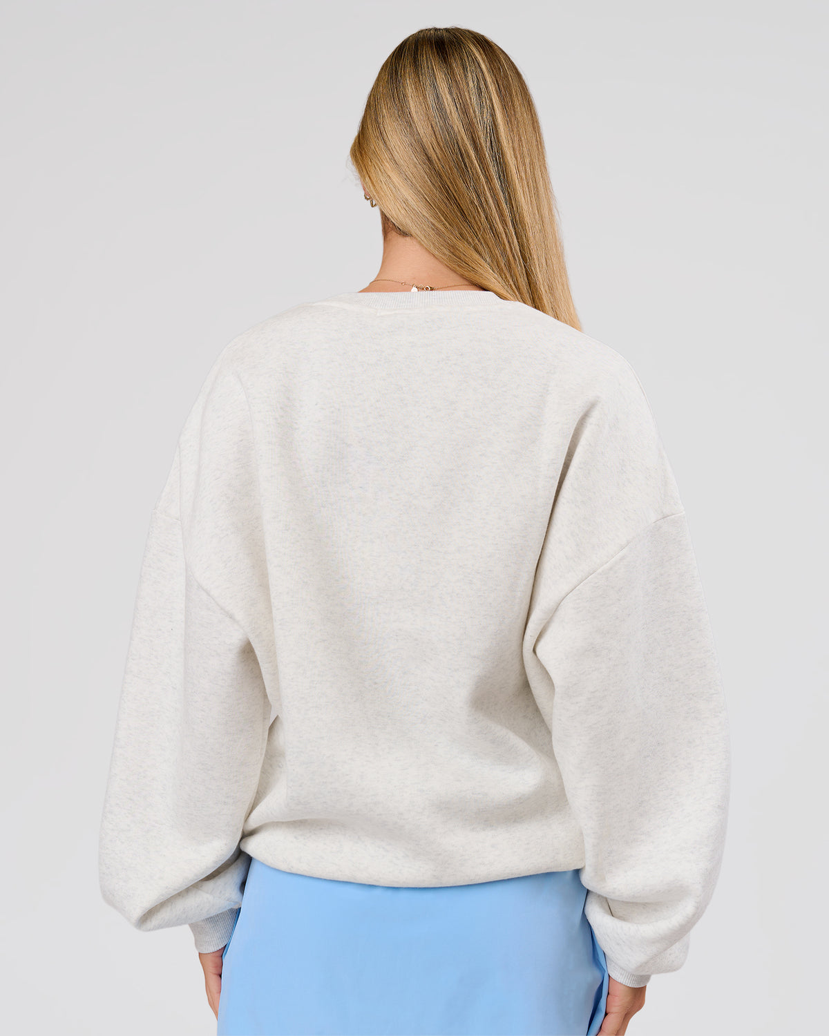 Woman wearing Playbook Boxy Crew Sweater - Silver Marl-Open Air | Model:Issy | Size:XS - view 2