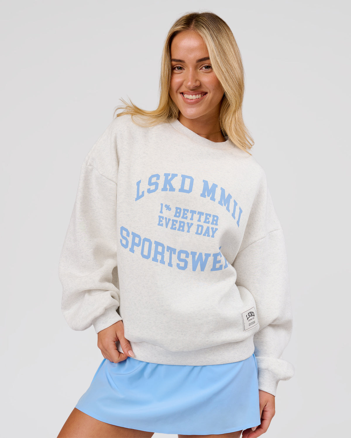 Woman wearing Playbook Boxy Crew Sweater - Silver Marl-Open Air | Model:Issy | Size:XS - view 1
