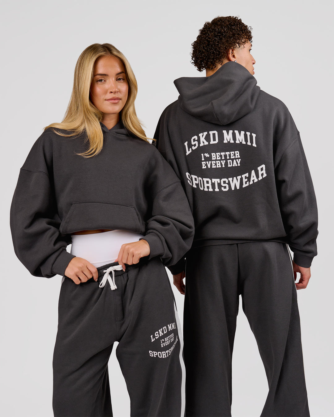 Woman wearing Playbook Boxy Hoodie - Onyx-Off White | Model:Issy | Size:XS - view 1