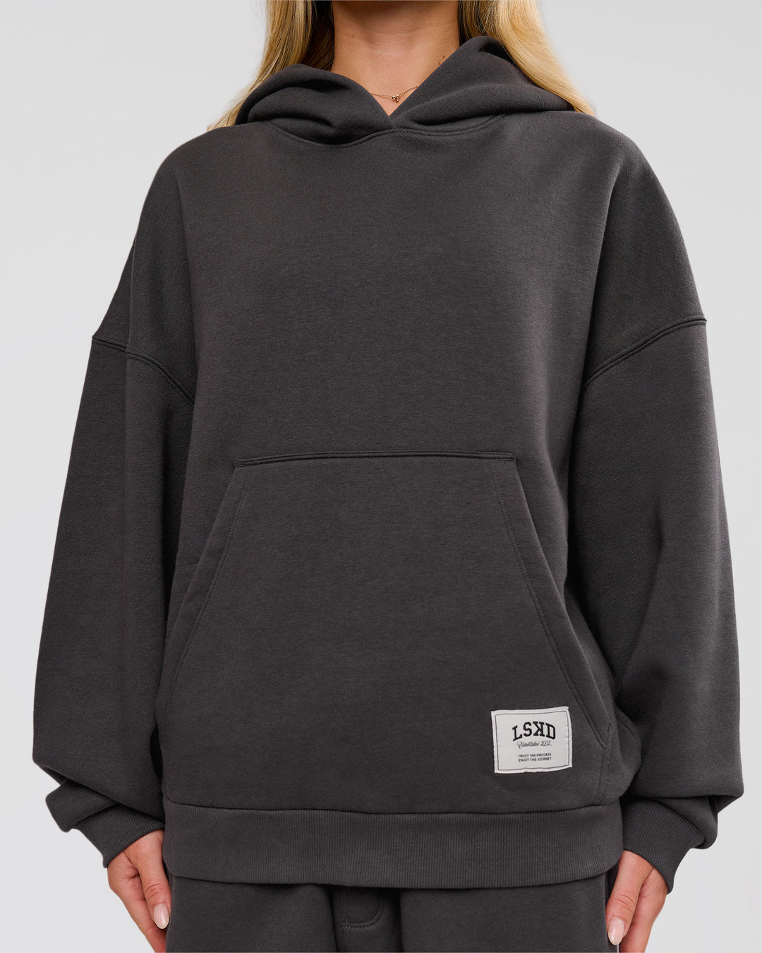 Woman wearing Playbook Boxy Hoodie - Onyx-Off White | Model:Issy | Size:XS - view 8