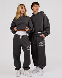 Woman wearing Playbook Boxy Hoodie - Onyx-Off White | Model:Issy | Size:XS | Thumbnail Index: 9