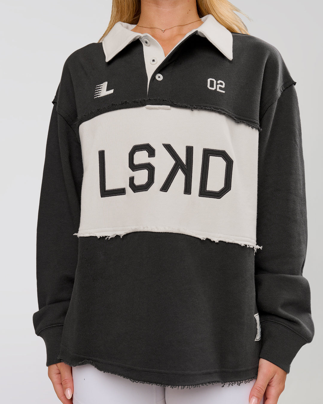 Woman wearing Playbook Unisex Collared Sweater - Onyx-Off White | Model:Issy | Size:XS - view 17