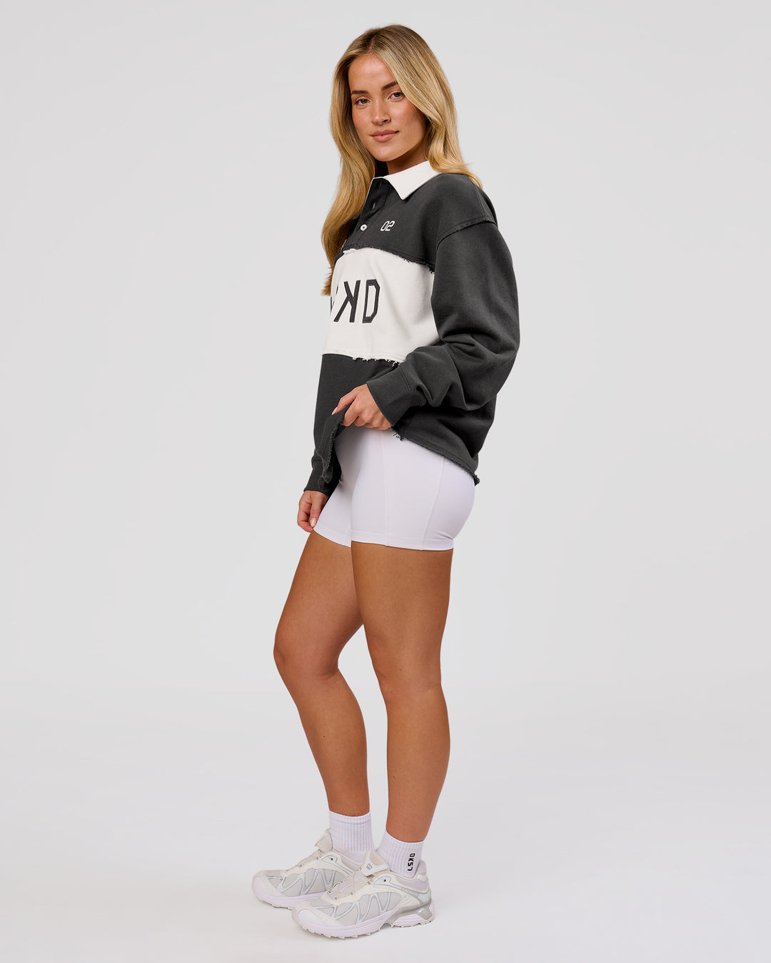Woman wearing Playbook Unisex Collared Sweater - Onyx-Off White | Model:Issy | Size:XS - view 19