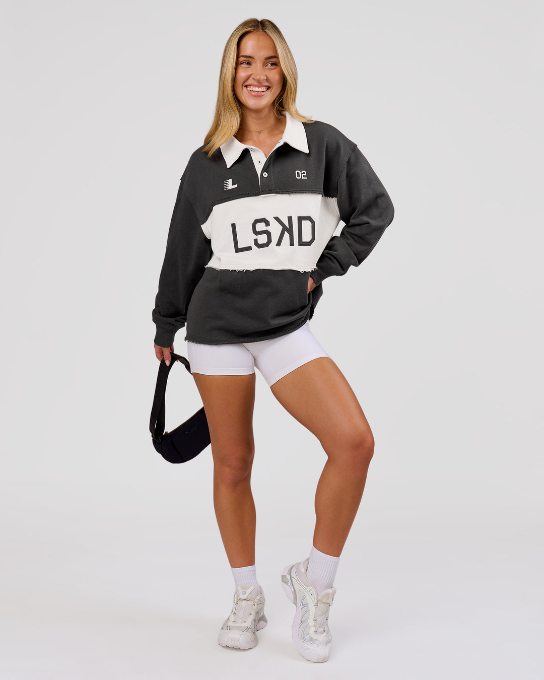 Woman wearing Playbook Unisex Collared Sweater - Onyx-Off White | Model:Issy | Size:XS - view 21