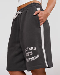 Woman wearing Playbook Varsity Fleece Shorts - Onyx-Off White | Model:Issy | Size:XS | Thumbnail Index: 13