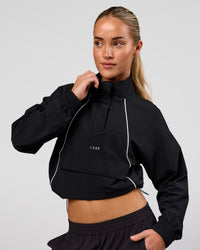 Woman wearing Pop Over Jacket - Black | Model:Issy | Size:XS | Thumbnail Index: 2